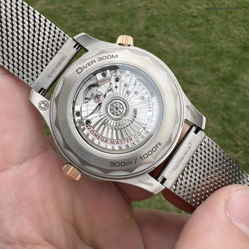 Super Clone Omega Seamaster 210.90.42.20.10.001 Bronze-Gold Titan Mesh-Armband 42 mm
