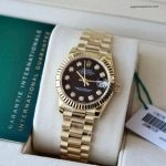 Premium Replica Uhr Rolex Lady-Datejust 178278 Schwarz-Gold mit Diamantindizes 31mm