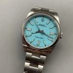 Premium Replica Uhr Rolex Oyster Perpetual 124300 mit türkisfarbenem Zifferblatt und Edelstahlband 41 mm