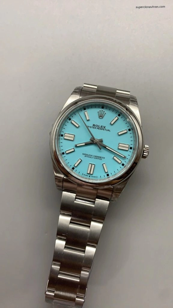 Premium Replica Uhr Rolex Oyster Perpetual 124300 mit türkisfarbenem Zifferblatt und Edelstahlband 41 mm
