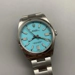 Premium Replica Uhr Rolex Oyster Perpetual 124300 mit türkisfarbenem Zifferblatt und Edelstahlband 41 mm