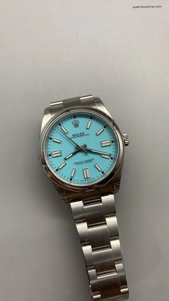 Premium Replica Uhr Rolex Oyster Perpetual 124300 mit türkisfarbenem Zifferblatt und Edelstahlband 41 mm