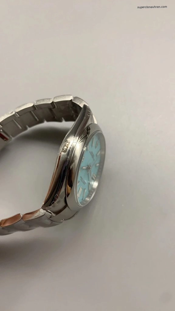 Premium Replica Uhr Rolex Oyster Perpetual 124300 mit türkisfarbenem Zifferblatt und Edelstahlband 41 mm