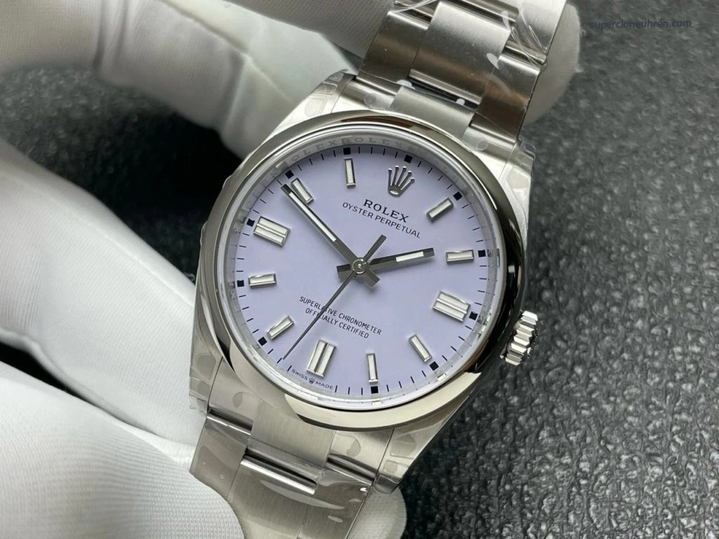 Premium Replica Uhr Rolex Oyster Perpetual m126000-0013 mit lavendelfarbenem Zifferblatt und Edelstahlband 36mm