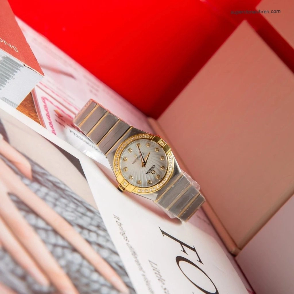 Premium Replica Uhr Omega Constellation 123.25.27.60.55.004 mit Gelbgold und Diamantbesatz 27 mm