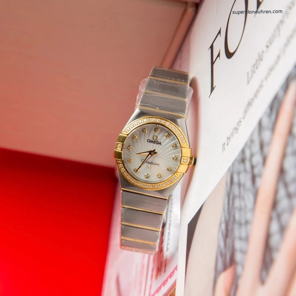Premium Replica Uhr Omega Constellation 123.25.27.60.55.004 mit Gelbgold und Diamantbesatz 27 mm