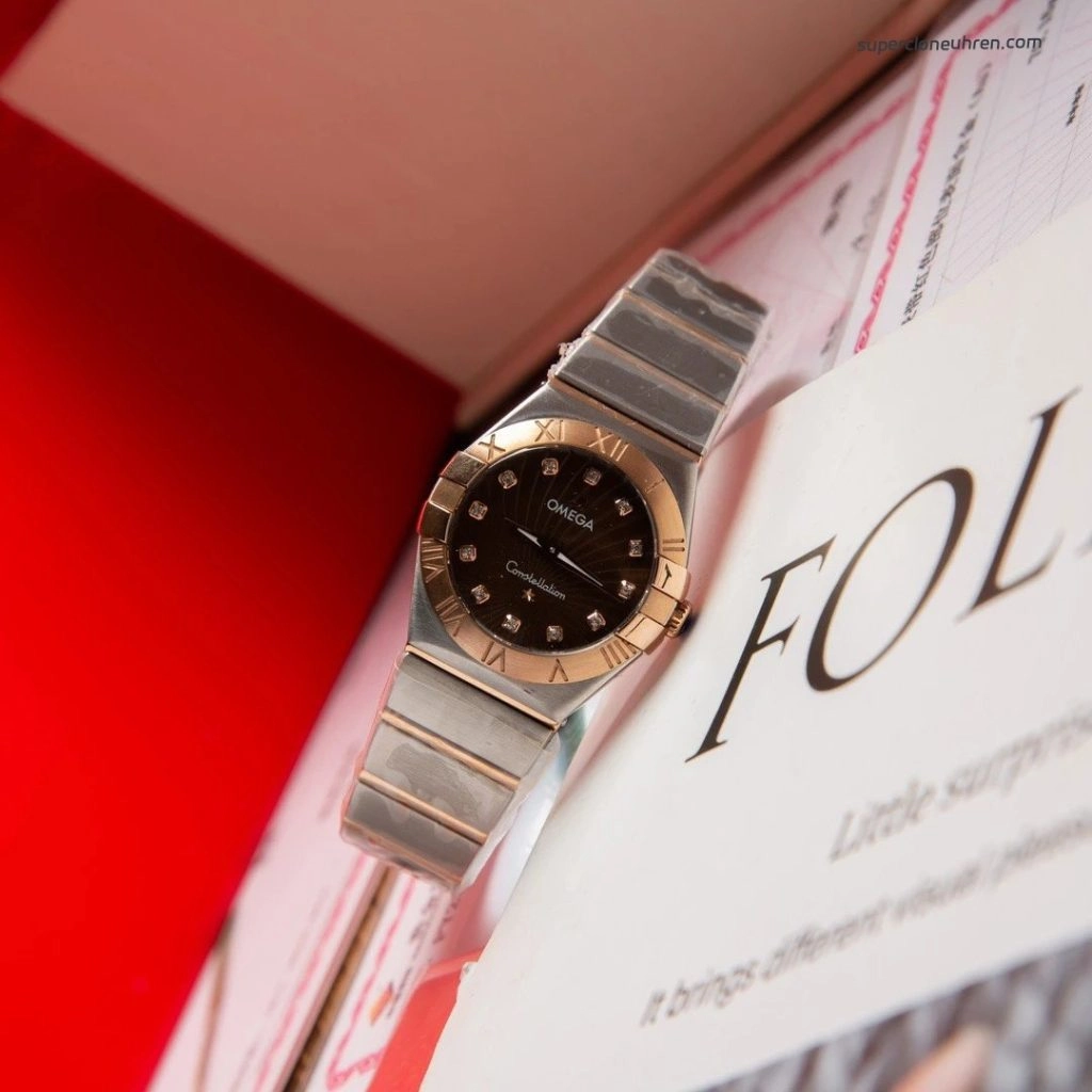Premium Replica Uhr Omega Constellation 123.20.27.60.63.001 mit Diamanten und Bicolor-Look 27mm