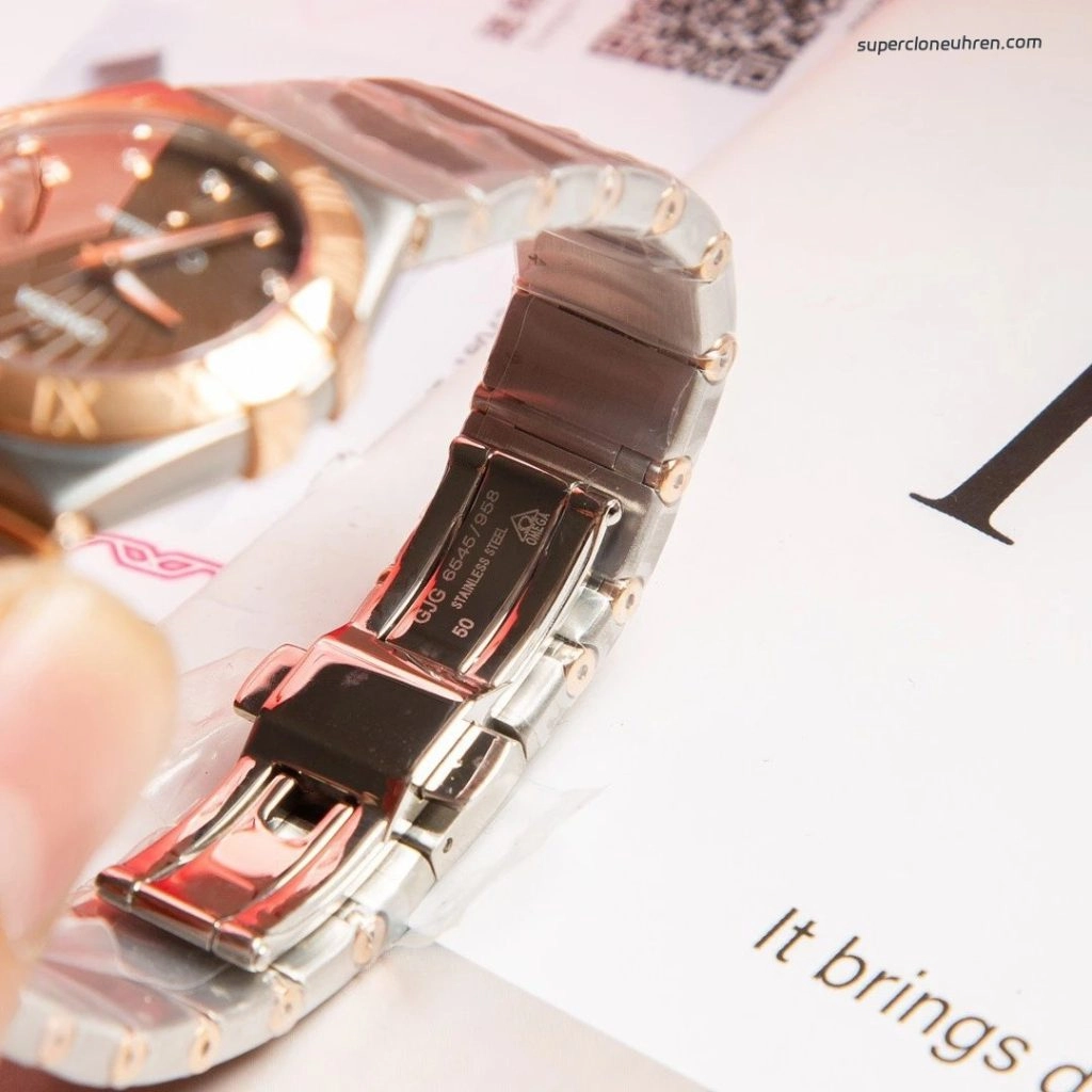 Premium Replica Uhr Omega Constellation 123.20.27.60.63.001 mit Diamanten und Bicolor-Look 27mm