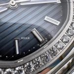 Premium Replica Uhr Patek Philippe Nautilus 5713/1G-010 mit Diamantlünette aus Edelstahl 40mm